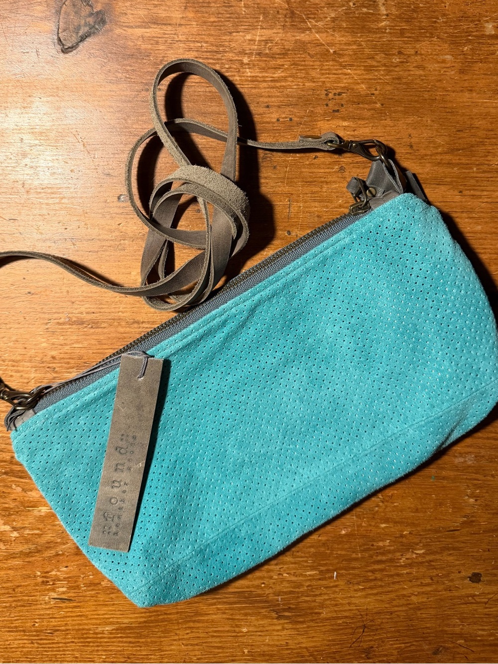found. Leather Goods Essential Suede Crossbody